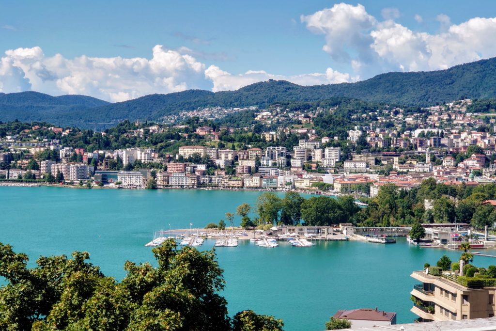 Panoramic view over Lugano city on the way down from Monte Bre