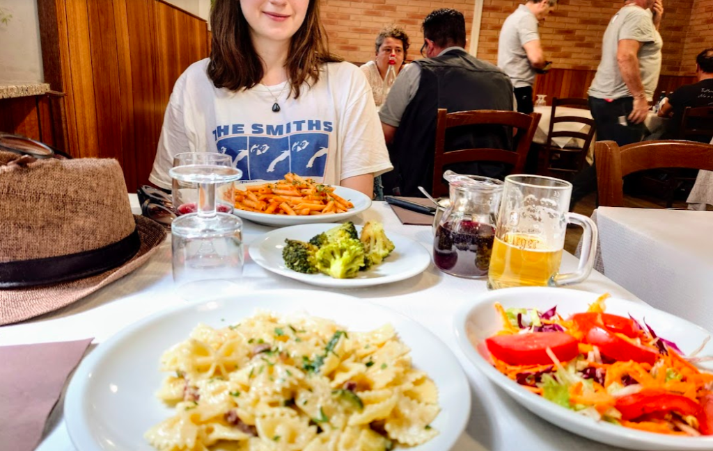 Local food at Charlot in Bergamo with girl wearing "The Smiths" shirt