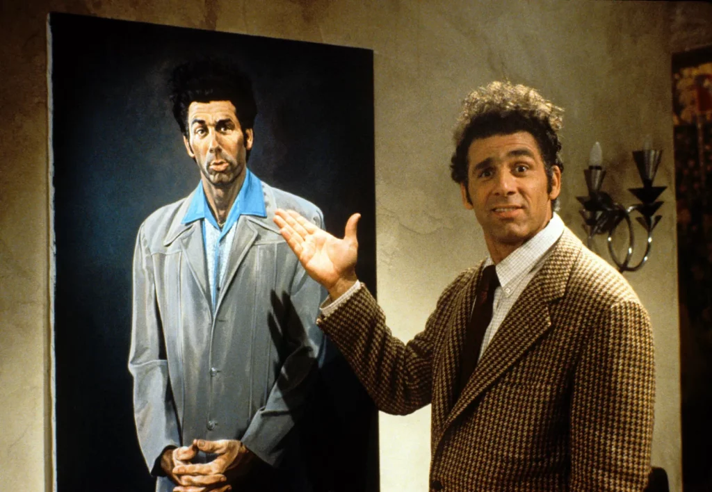 Cosmo Kramer looking at a portrait of himself